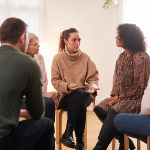 Women speaking at a parent support group